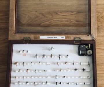 Alternative view of Musical presentation box of 72 fishing flies and insects tied by 'Choro' to display