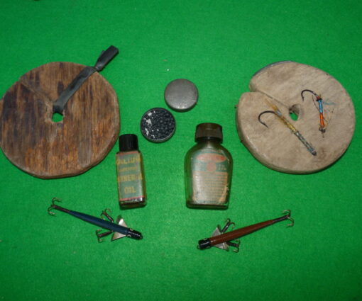 A mixed bundle of vintage tackle comprising Pflueger,Kalium,early Gut Eyed salmon flies