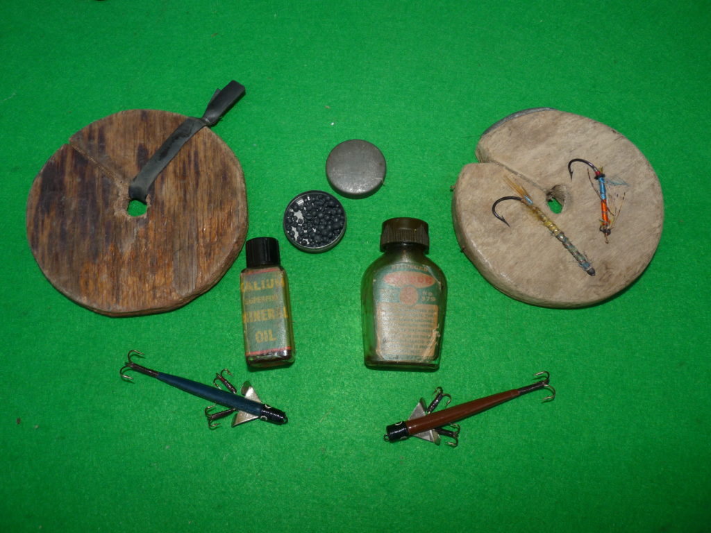 A mixed bundle of vintage tackle comprising Pflueger,Kalium,early Gut Eyed salmon flies