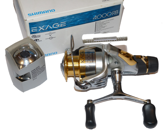 Shimano Exage 4000RB fixed spool reel with drag system, spare spool and box unused - Image 2