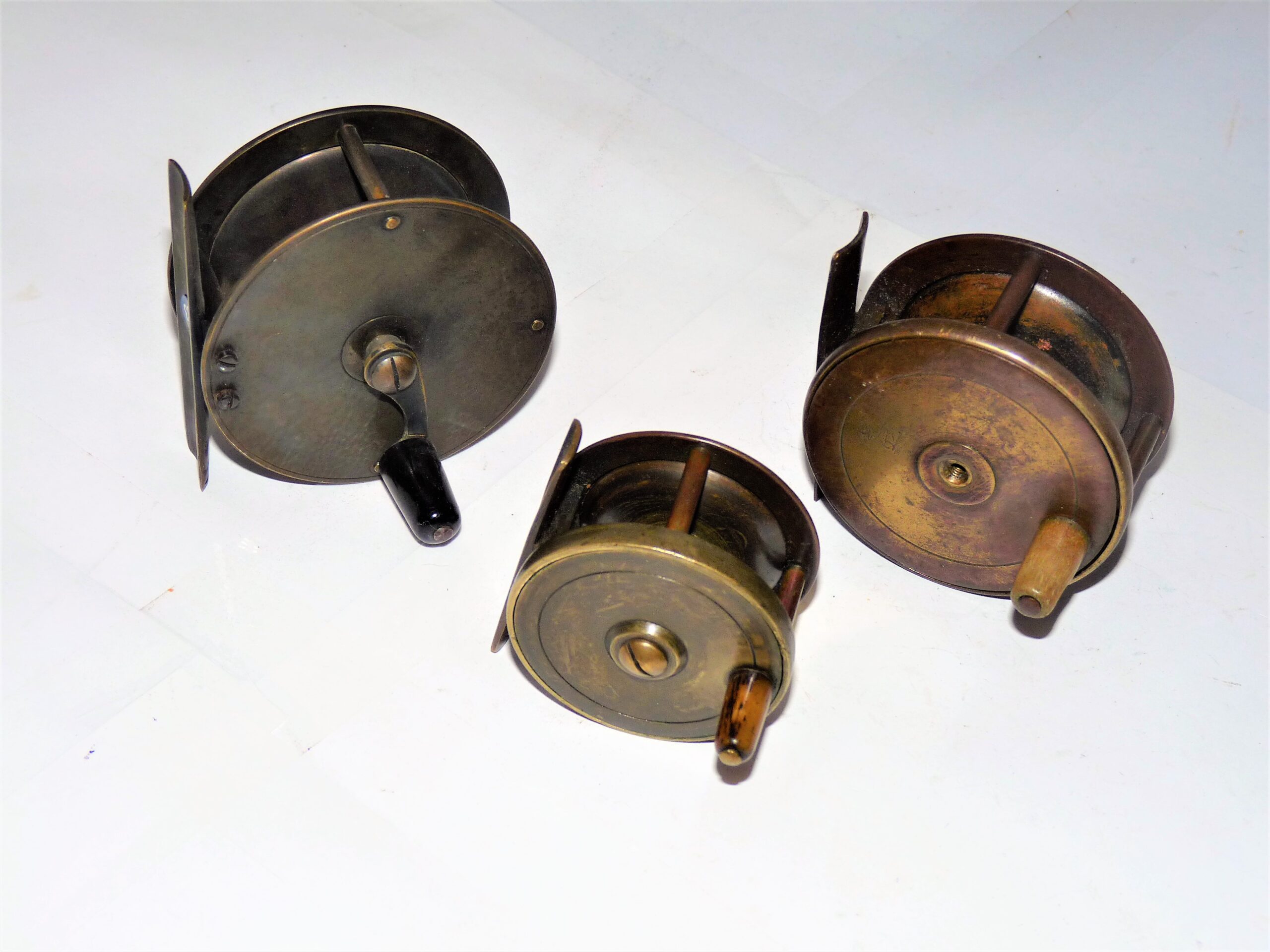 3 English vintage brass reels 2" 2.5" 2.75"