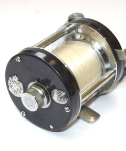 Alternative view of Abu Ambassadeur 6000 C multiplier reel, spanner & s/spool in tub