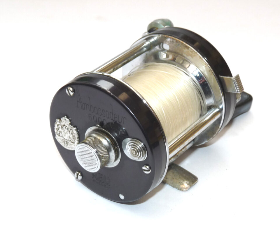 Alternative view of Abu Ambassadeur 6000 C multiplier reel, spanner & s/spool in tub