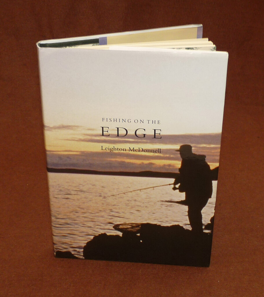 Fishing On The Edge, L. McDonnell, 2006 1st edition, 152/695, twice signed fishing book