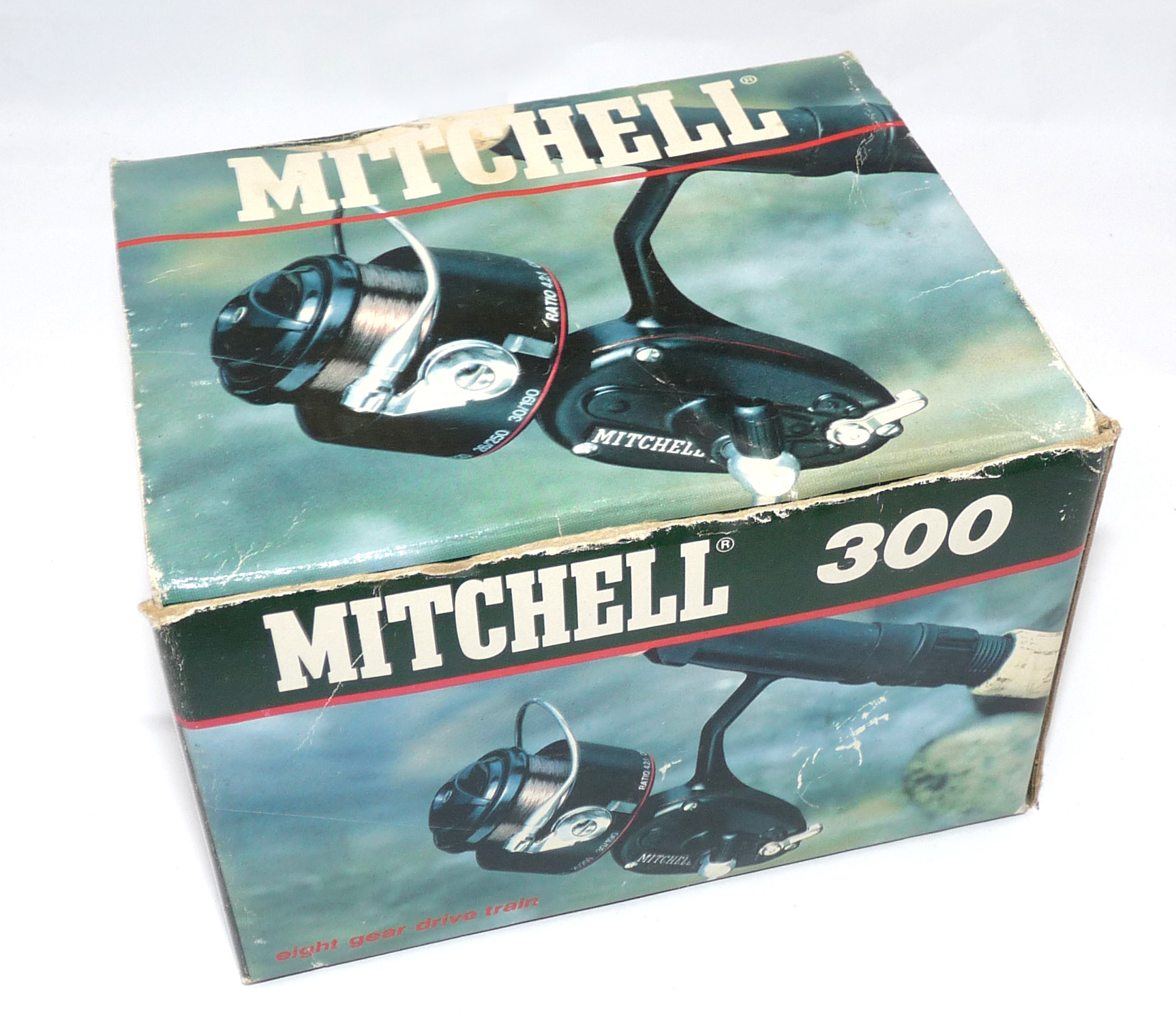 Mitchell 300 vintage spinning reel with box spool and papers to