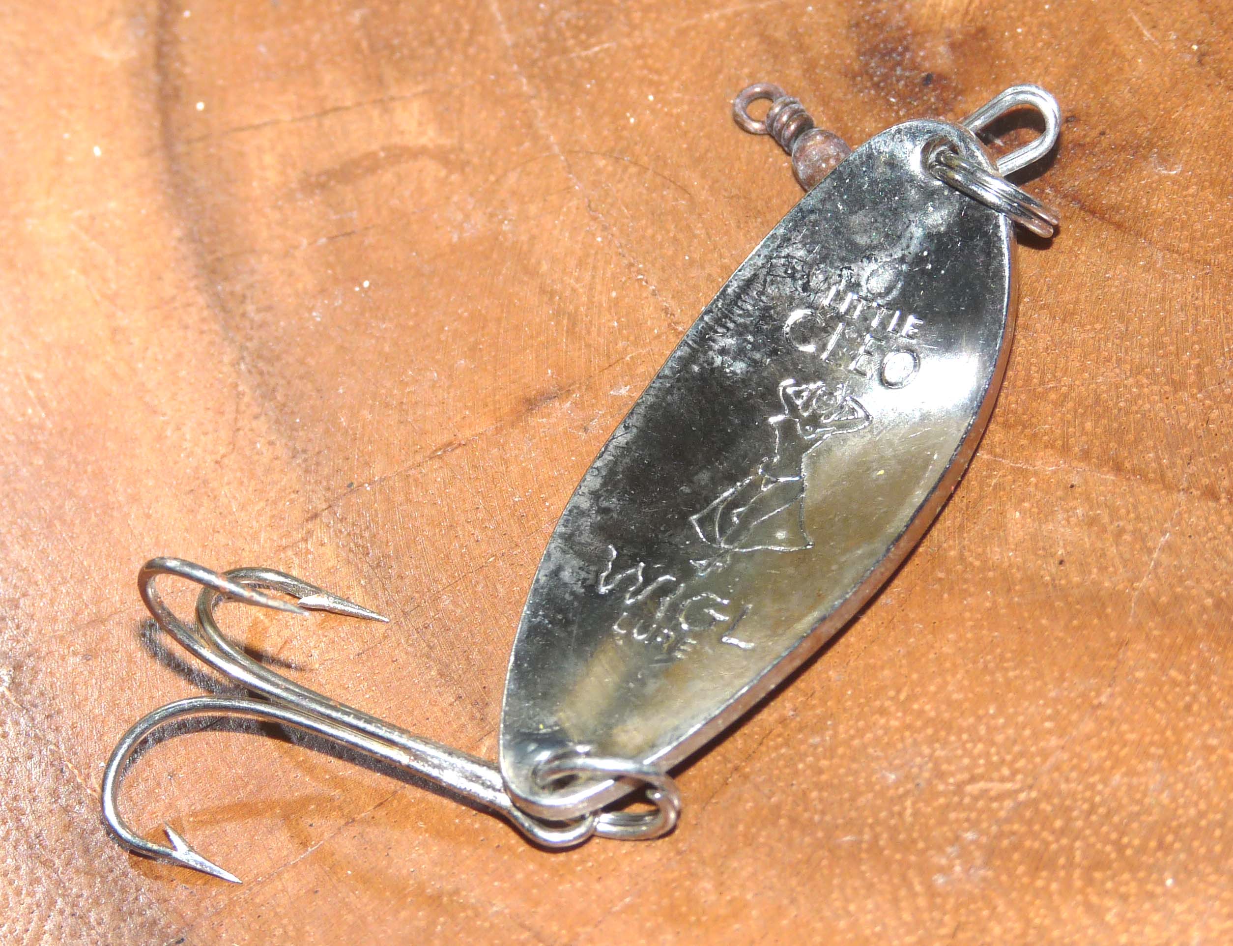The Little Cleo Wigl Lure was a bit risqué for its time. - Thomas Turner  Fishing Antiques