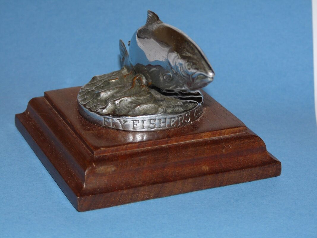 The Fly fishers Club mascot