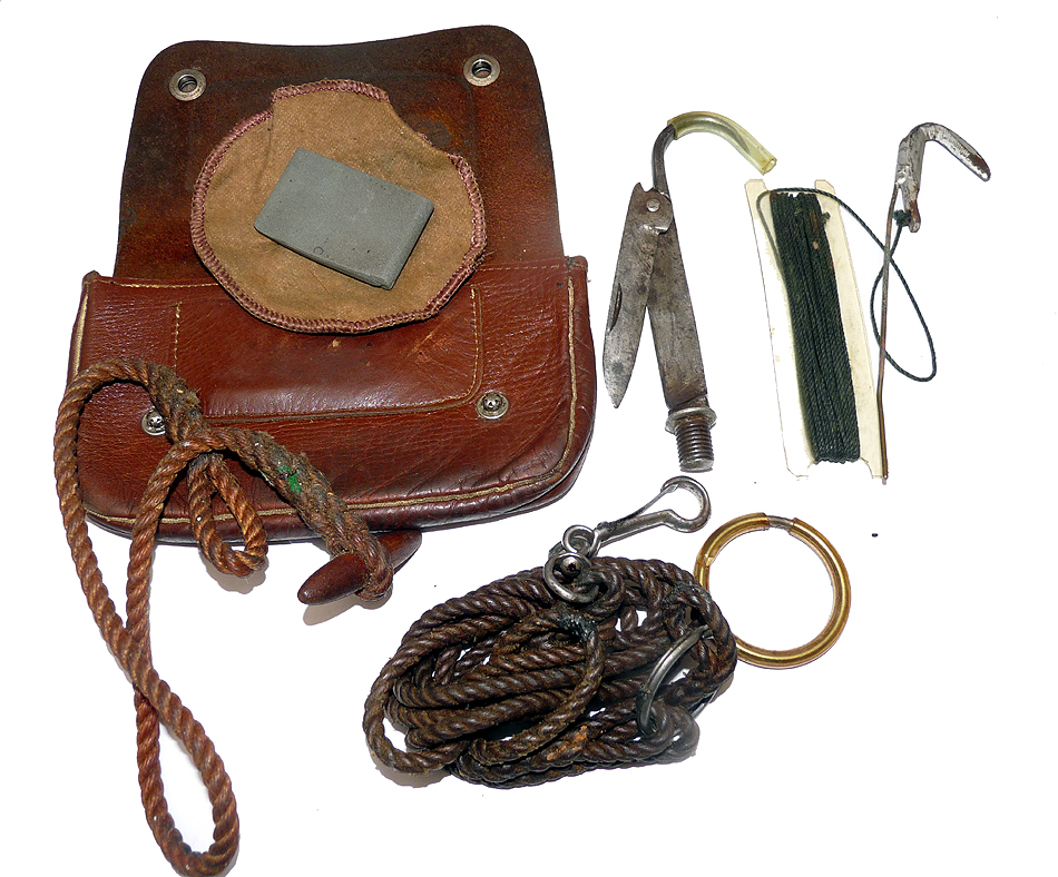Antique fishing twig and weed cutter, wallet and sharpener