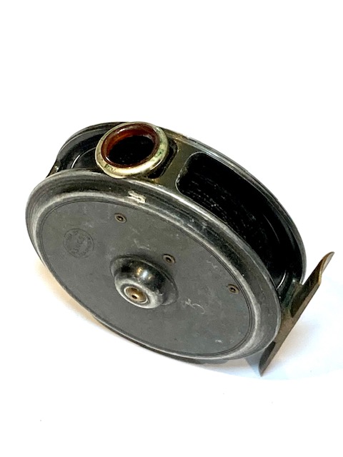 Alternative view of Army & Navy 3.5" trout fly reel with red agate line guide