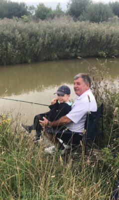 Nigel and his Grandson William fishing