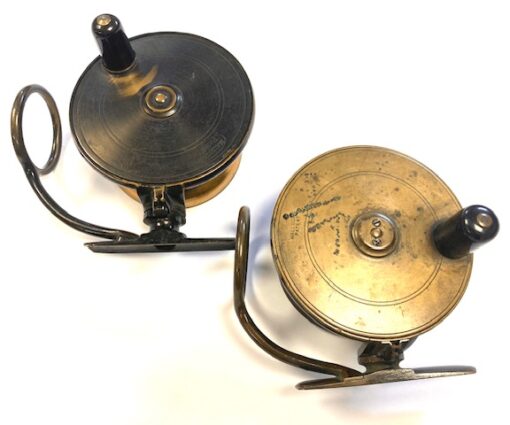 Alternative view of Malloch Patent pair of vintage fishing side casting reels