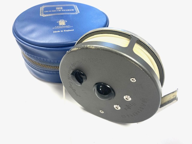 Alternative view of Hardy Marquis #8/9 trout fly reel with Hardy pouch