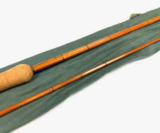 Vintage Elasticane Lea 1 two piece 7' cane spinning rod in green bag