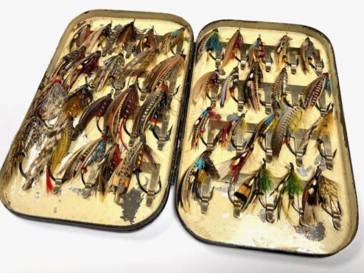 14 antique large gut eyed salmon flies stitched onto grey card, hook sizes  1/0 to 7/0