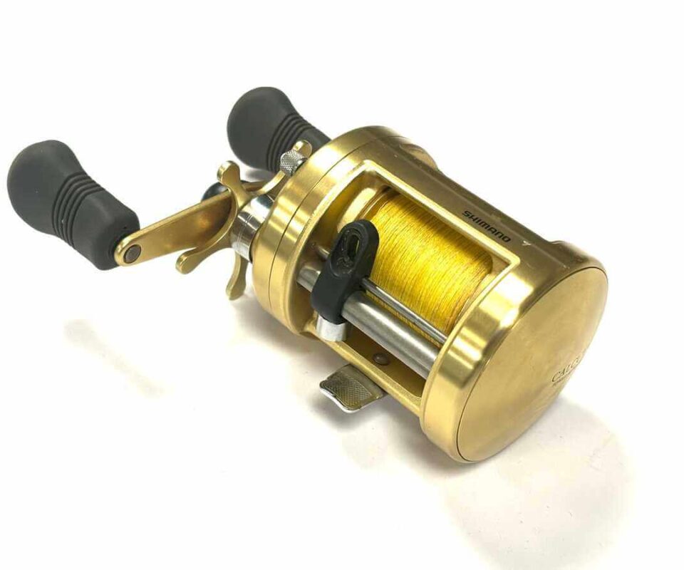   Shimano Calcutta 400 multiplier sea reel with gold finish plus optional check