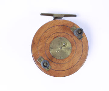   Unknown wood and brass Nottingham 3 7/8 " Casting reel