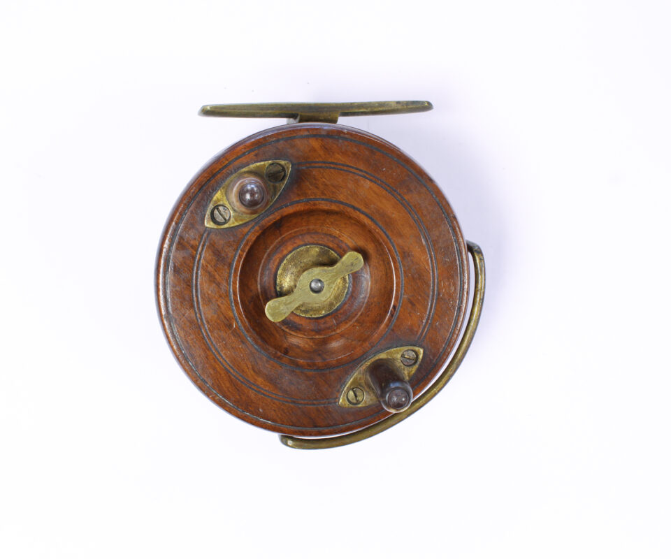   Unknown wood and brass Nottingham 3 1/2 " Casting reel