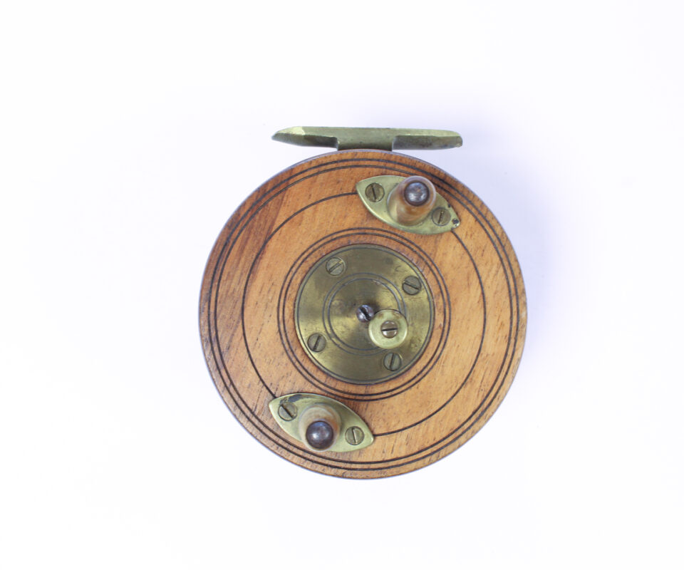   Unknown wood and brass Nottingham 3 1/2 " Casting reel