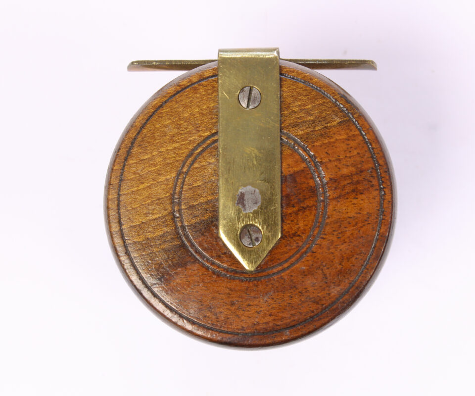   Unknown wood and brass Nottingham 2 1/2 " Casting reel
