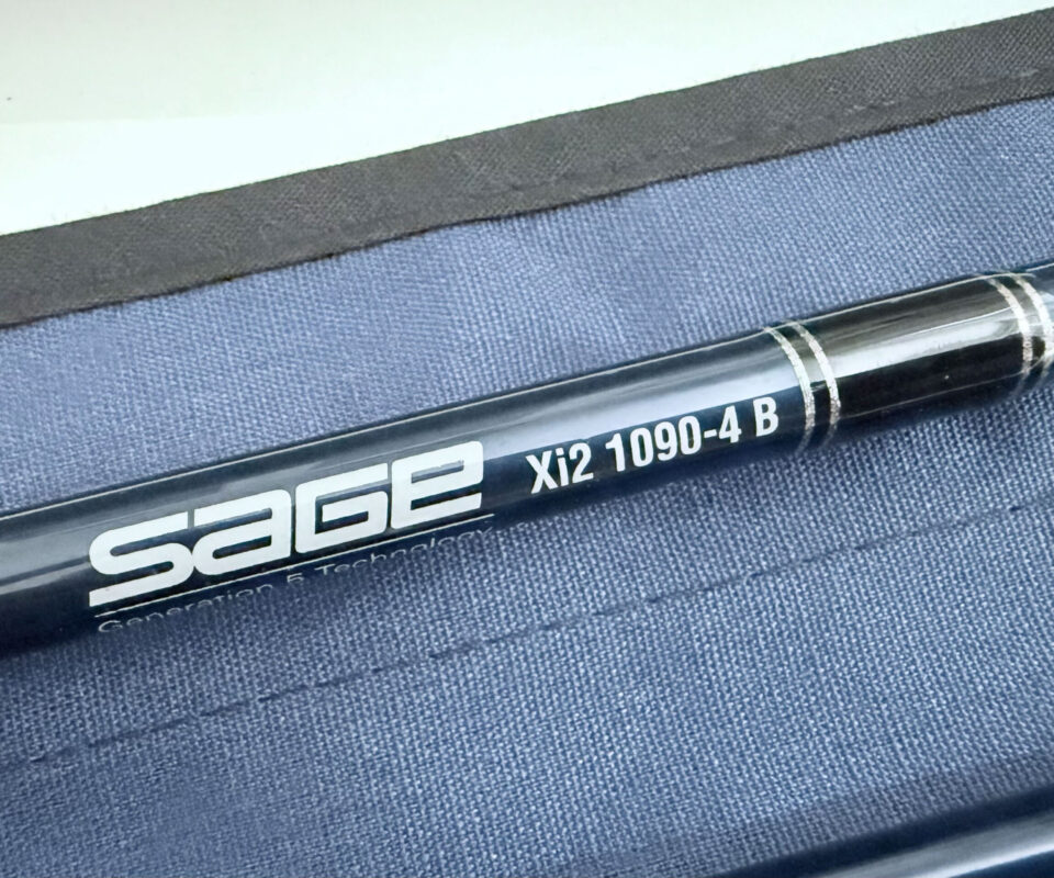   Sage Xi2 9′ 4 Piece Carbon Fly Rod #10 with Sage bag and alloy tube