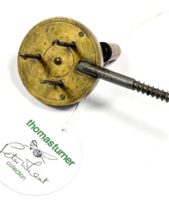   A very rare 1 7/8" brass gut twister