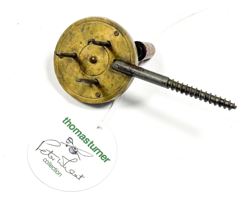   A very rare 1 7/8" brass gut twister