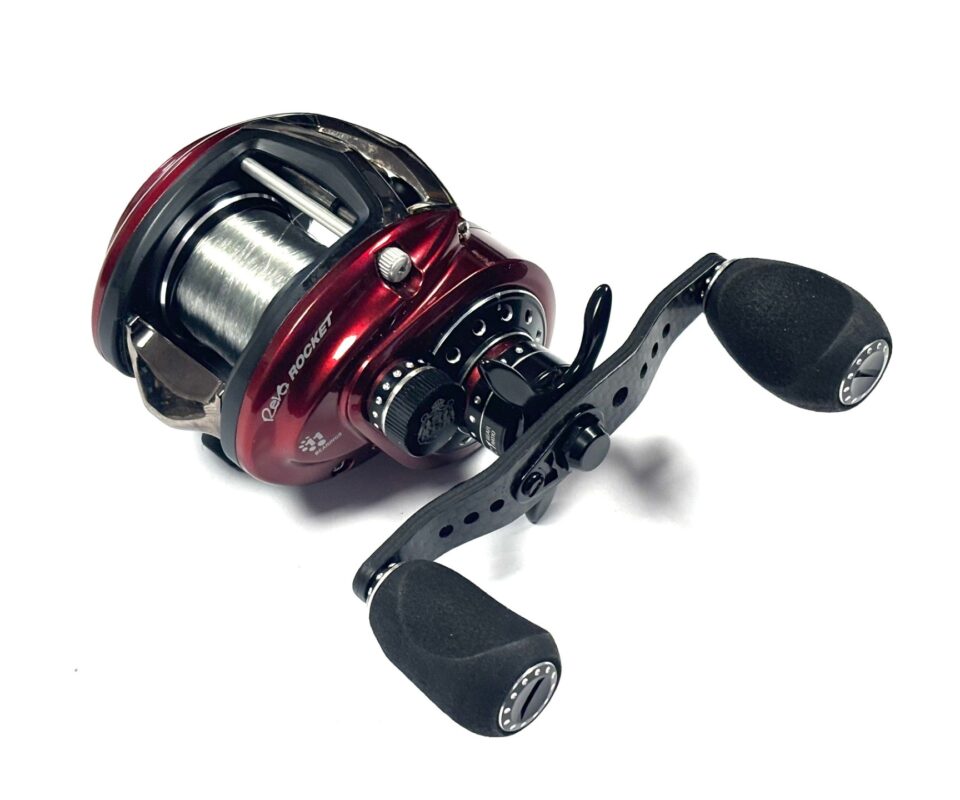   Abu Revo Rocket low profile multiplier reel red finish & carbon accents. 11 bearing 9:1 ratio