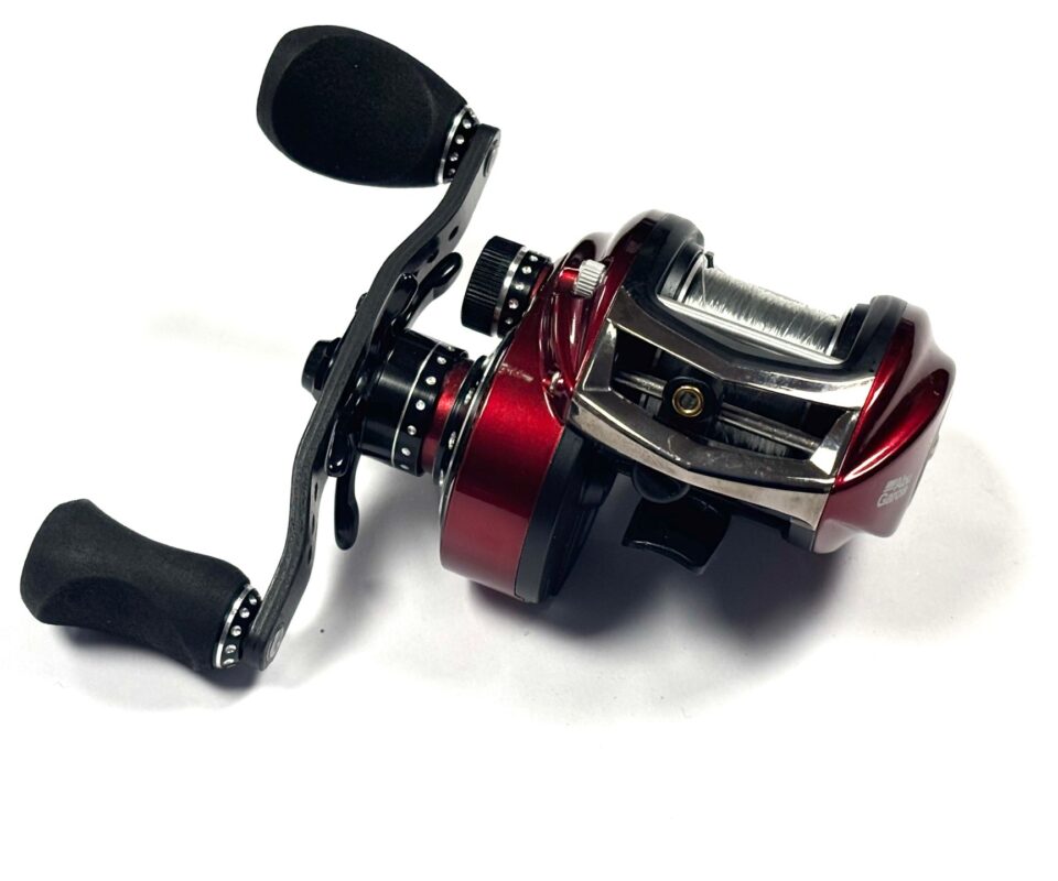   Abu Revo Rocket low profile multiplier reel red finish & carbon accents. 11 bearing 9:1 ratio
