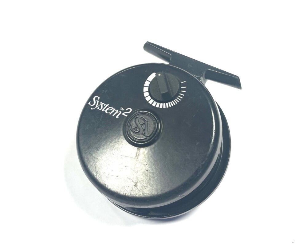 Alternative view of System Two 78 Made in England fly reel with three spare spools